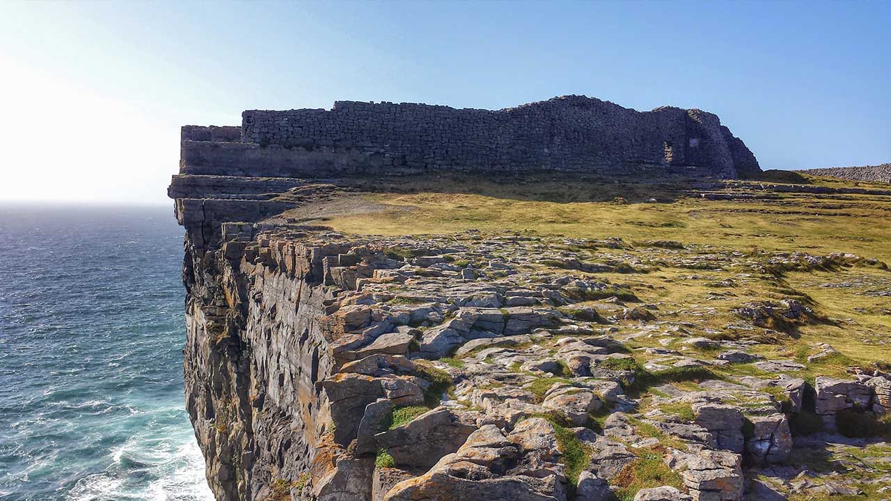 The Iron Age fort at Dún Aonghasa perched on the edge of a cliff